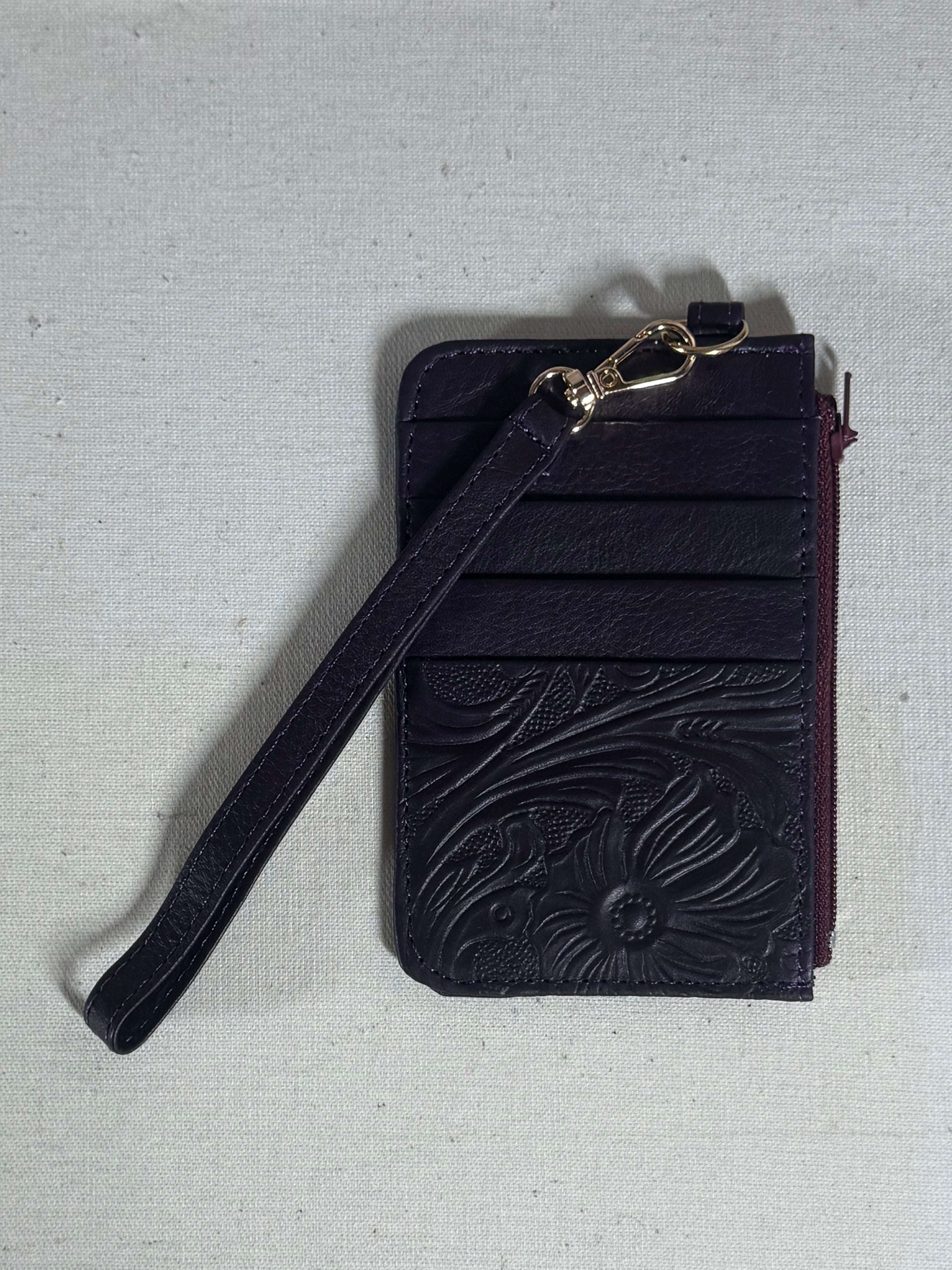 Purple leather ID card wallet with wristlet strap and four ID slots