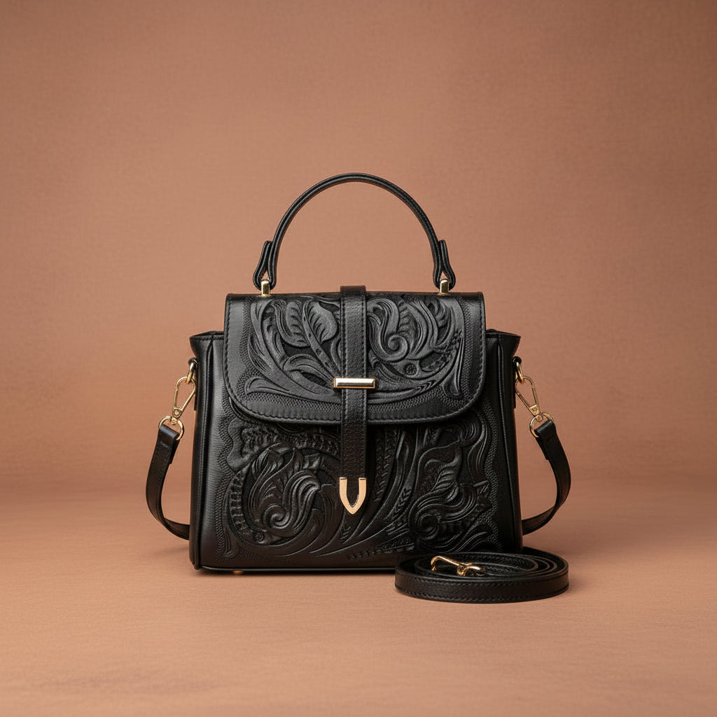 Black tooled handbag, leather